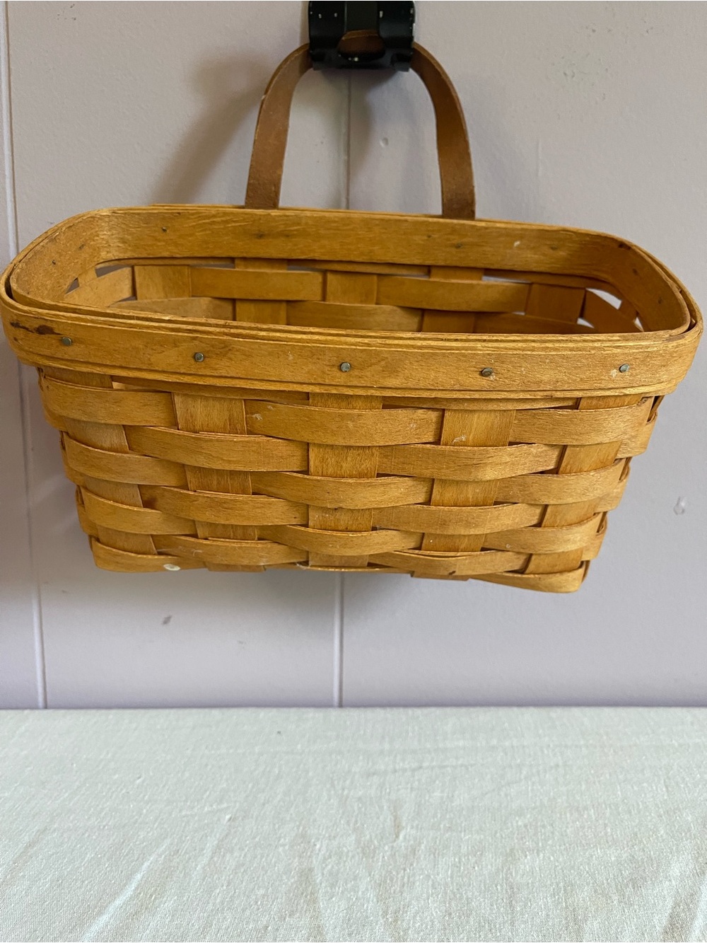 Longaberger woven basket in warm tan